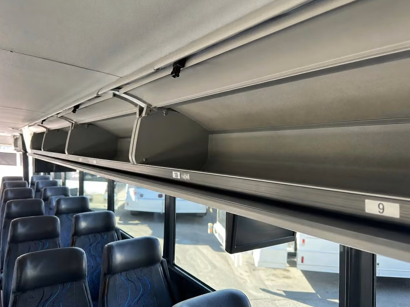 west allis 25 passenger minibus overhead storage